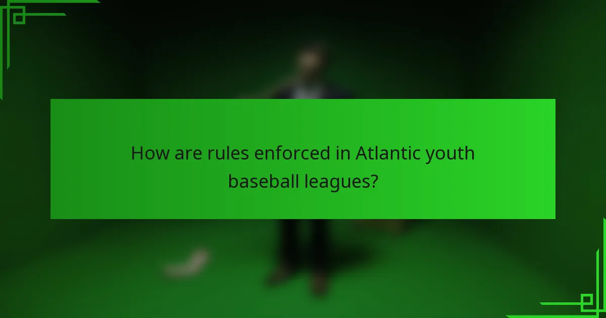 How are rules enforced in Atlantic youth baseball leagues?